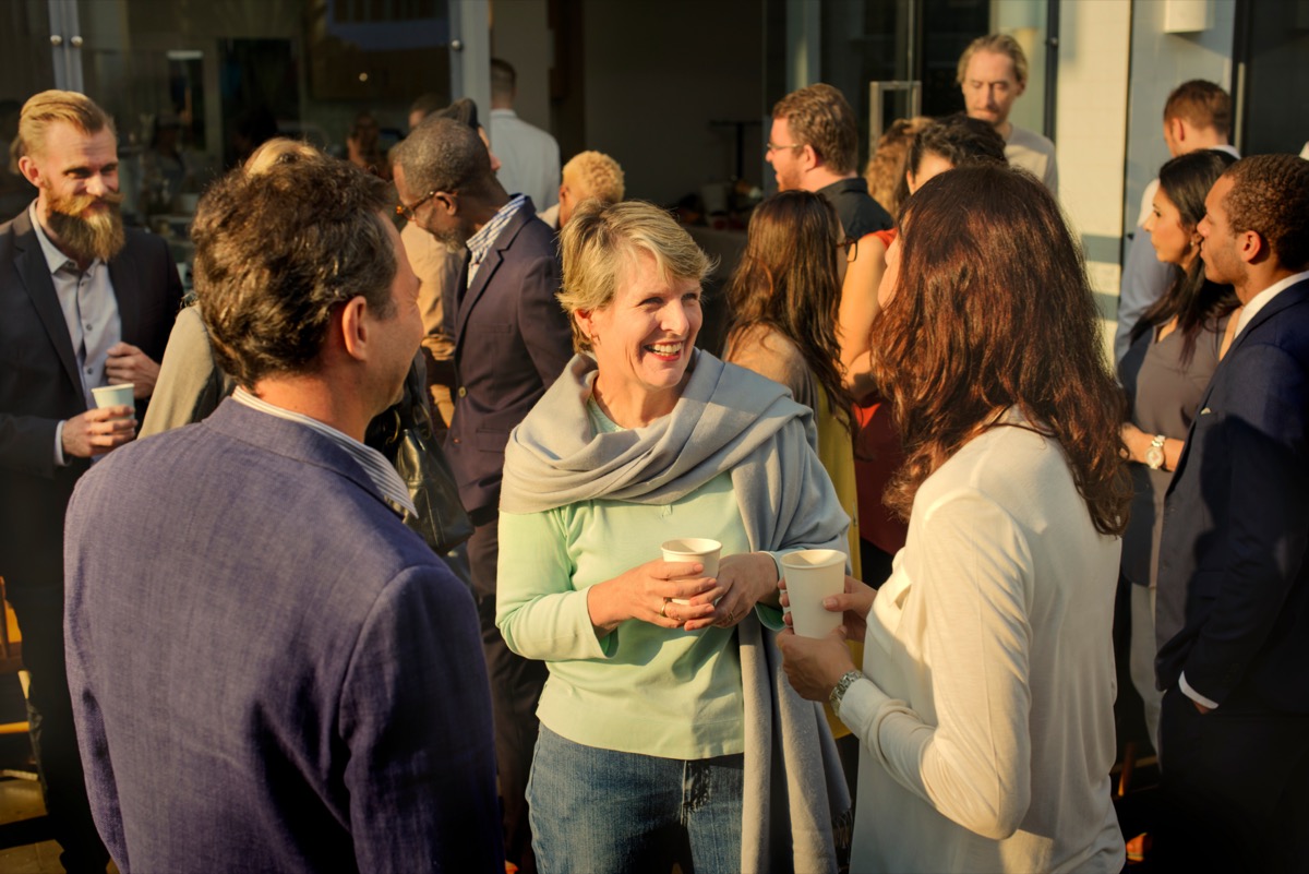People mingling at an event; OCT Europe concept