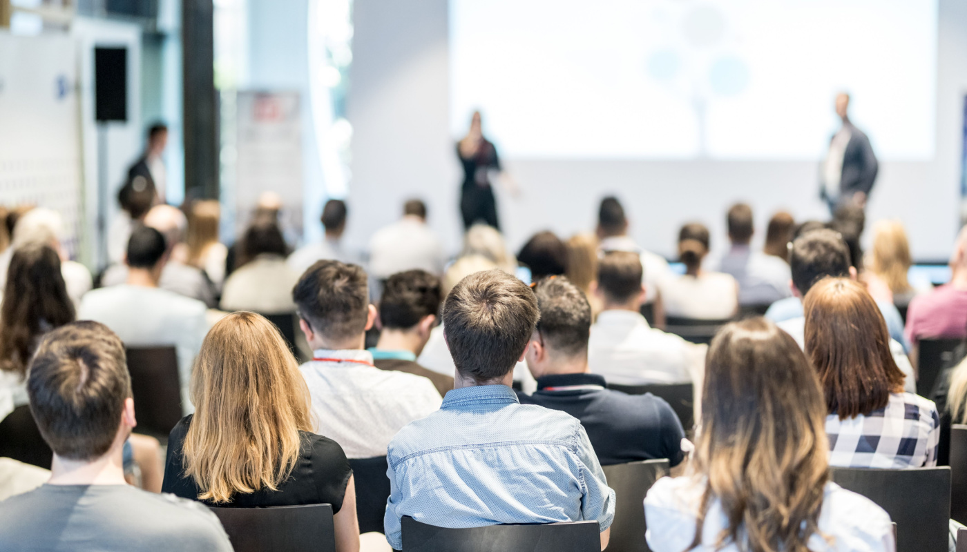 ANJ398S Speaker giving a talk to audience in a conference hall; ISMPP Europe 2024 concept