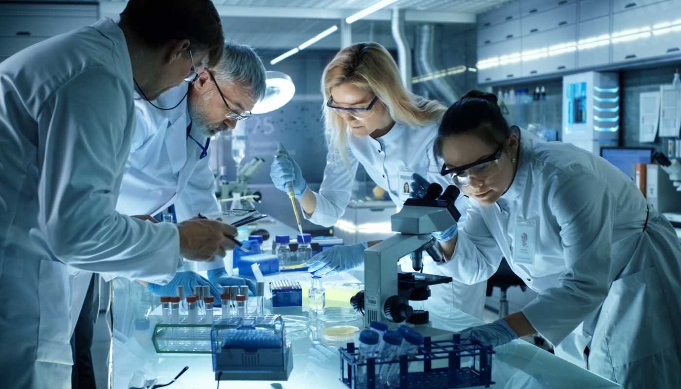 Medical research scientists working in a laboratory; biopharma companies concept