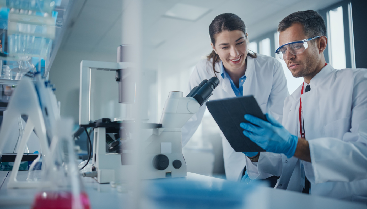 Scientists working in a pharmaceutical lab; biopharma companies concept