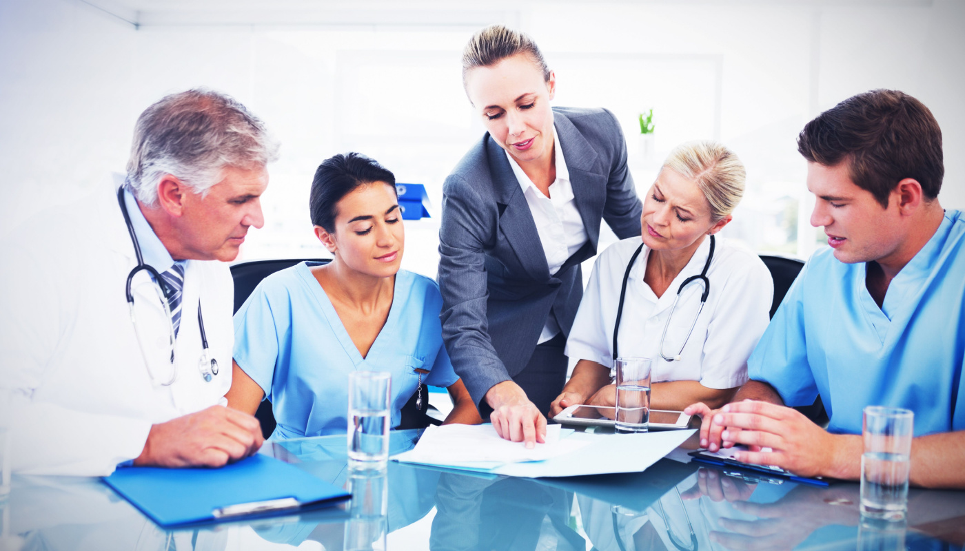 Team of healthcare professionals having a meeting in a medical office; clinical trial endpoints concept